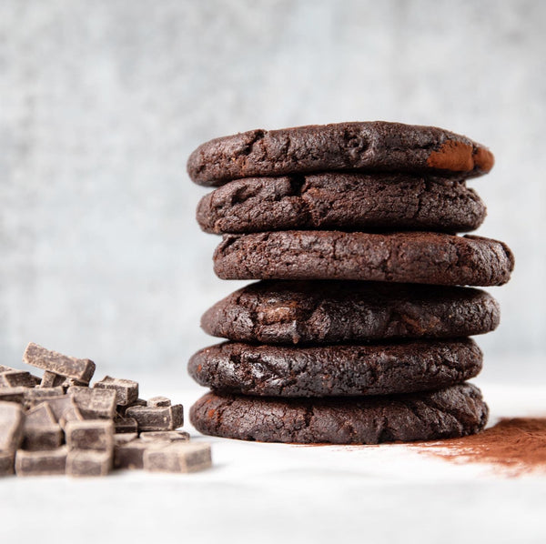 Half-dozen cookies. Stack of 6 freshly baked Double Chocolate Cookies with powdered cocoa. Baked fresh daily in our San Francisco, California bakery with premium and organic ingredients.