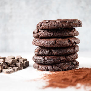 Stack of 6 freshly baked Double Chocolate Chip Cookies with powdered cocoa. Baked fresh daily in our San Francisco, California bakery with premium and organic ingredients and 
